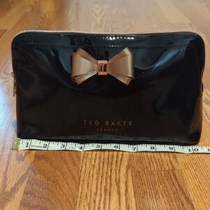 Ted Baker Glossy Black Bag with Gold Bow